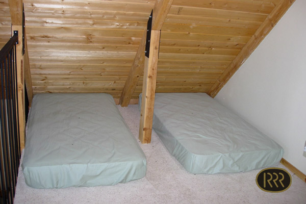 There's an additional sleeping area upstairs in the loft.